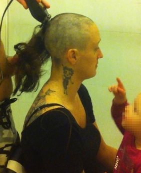 Elizabeth Edmonds posted photographs of her head being shaved to Facebook.