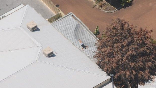 One person climbed onto the shopping centre roof, but couldn't hide from the police helicopter.