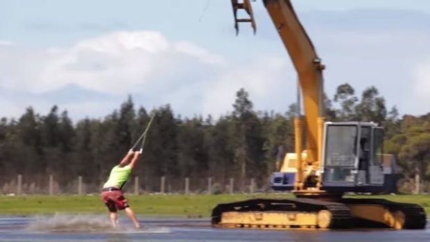 A group of South West tradies have made their own waterpark with an excavator.