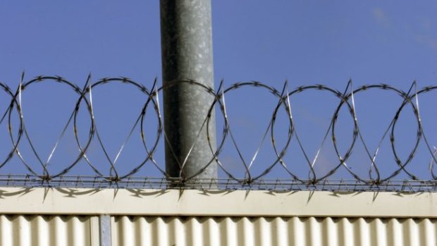Three prison officers are in hospital after a brawl broke out at a maximum security jail.