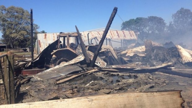 A shed destroyed by fire in the state's north-east.