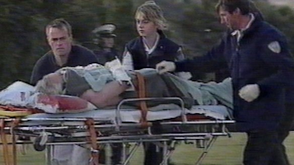 The shooting that changed Australia: a victim is rushed to  hospital after the Port Arthur massacre in 1996.