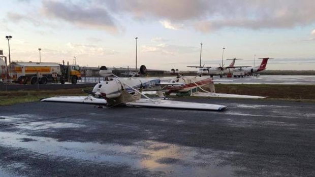Two light planes had flipped during the damaging storm.