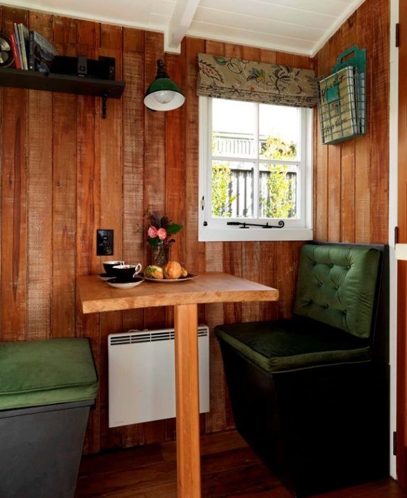 A mini-banquette works well in this tiny space.