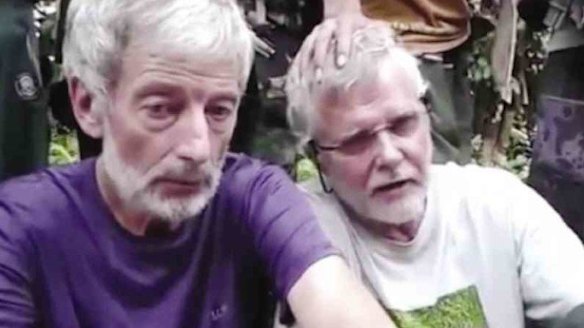 Canadians Robert Hall and John Ridsdel in a video still sent by Abu Sayyaf to media outlets. 