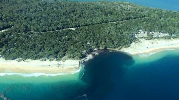 As captured by Higgins Storm Chasers, the erosion-hole that claimed a caravan and a car at Inskip Point, and triggered the evacuation of 140 campers.