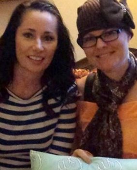 Woman adopts best friend's four daughters after her death