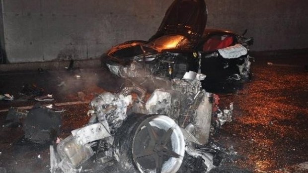 The wreckage of a Ferrari after the crash that killed Ling Gu, the son of Ling Jihua. The scandal raised questions about the public servant's income and lifestyle.