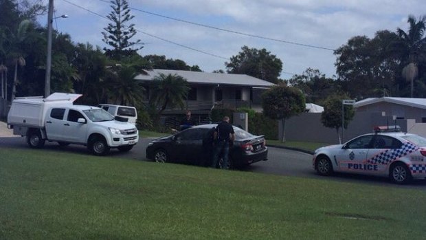 Police search for three people after a stolen car was dumped on the Sunshine Coast.