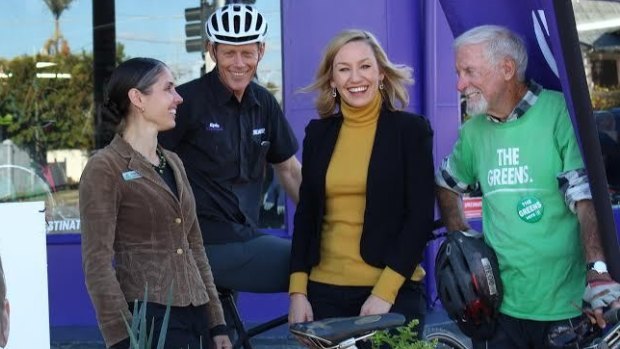 Greens candidates Kirsten Lovejoy (left) and Senator Larissa Waters at cycling policy launch with cycling enthusiast John Pittendreigh and Robert Byrnes