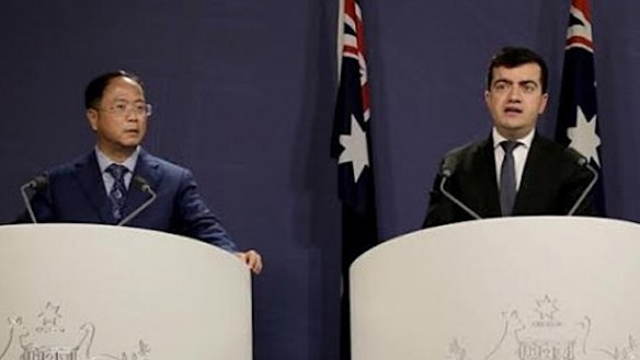 Huang Xiangmo and Sam Dastyari at a media conference for the Chinese community in Sydney last year.