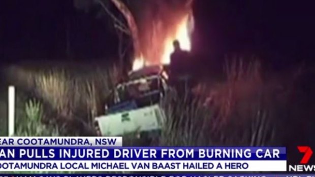 Michael van Baast pulls a man from a burning car near Cootamundra.