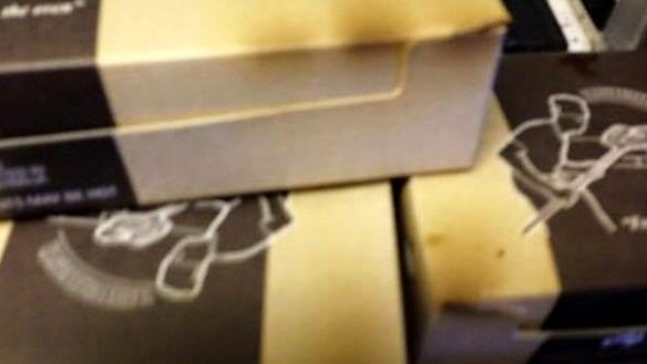 Qantas' cardboard meal boxes catch alight and smoulder in aircraft ovens