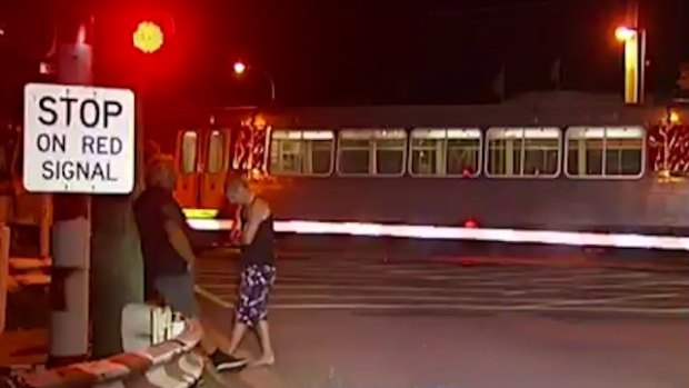 A man was allegedly being chased when he was hit by a train in Beenleigh, south of Brisbane.