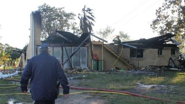 Fire has destroyed a family of eight's home south of Brisbane.