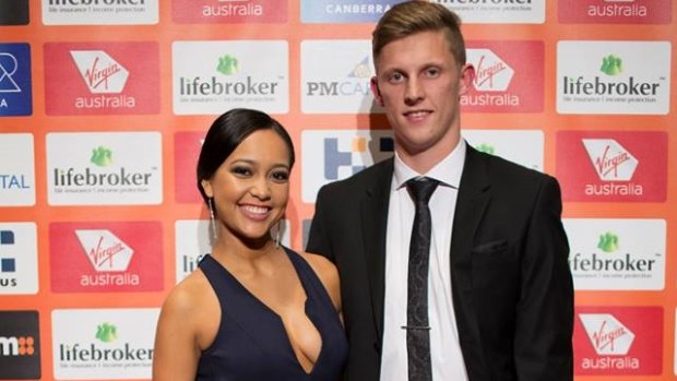 Lachie Whitfield and his then partner Sammi Nowland in 2014