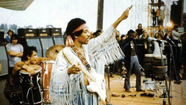 Hendrix at Woodstock in 1969, during the period the unreleased songs were recorded.