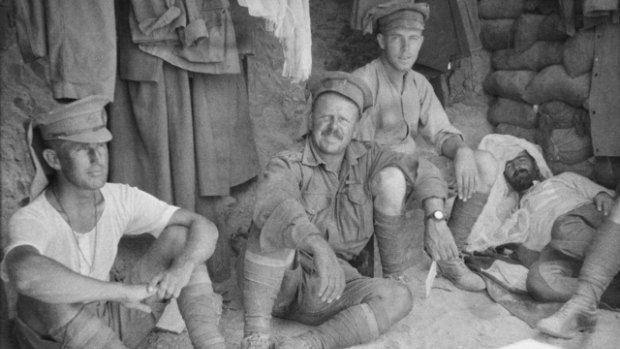 Australian soldiers rest in a dugout at Gallipoli. 