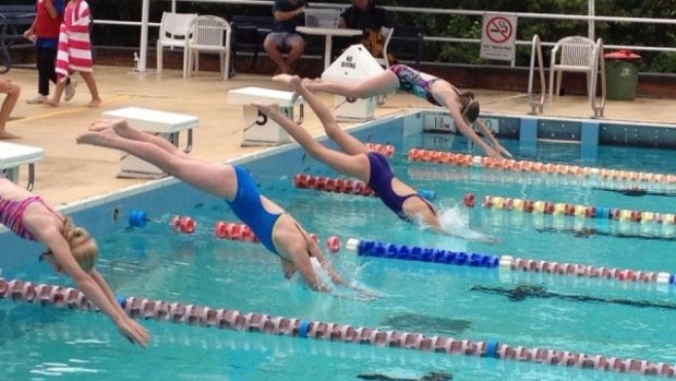 School children race at Epping Aquatic Centre at Dence Park.