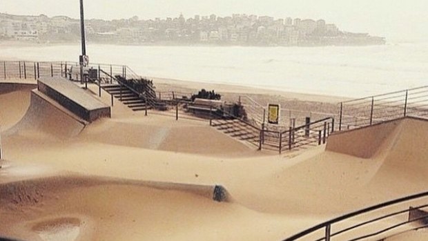 Sydney's thunderstorm looked more like the aftermath of a sandstorm at Bondi Beach