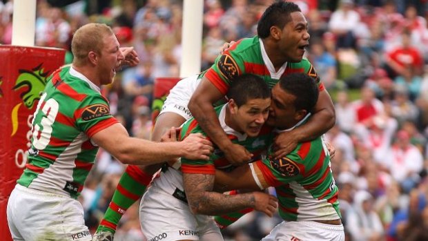 Moving on: Sandow and Peats celebrate a try with Dylan Farrell  and Michael Crocker (L) during their Souths days.