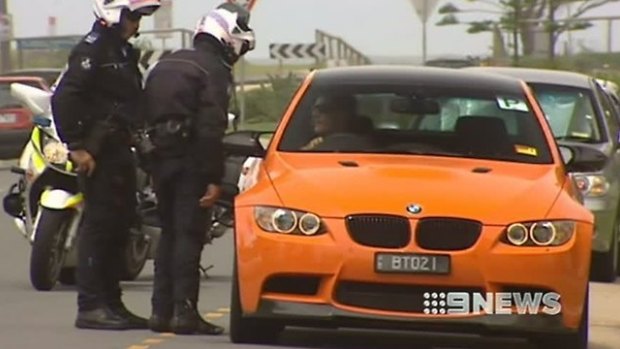 Bad boy: Bernard Tomic is pulled over by police.
