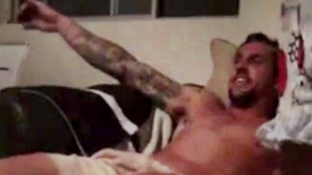 Damning: A still from the video showing a seemingly intoxicated Mitchell Pearce slumped in a chair