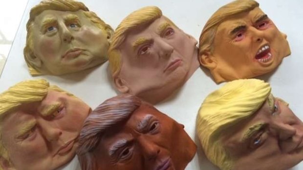 What's behind the mask? Donald Trump insists he has no business deals in Russia.