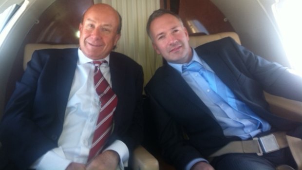 Former NewSat CEO Adrian Ballintine in corporate jet with the CFO of his yacht company, Jason Cullen.