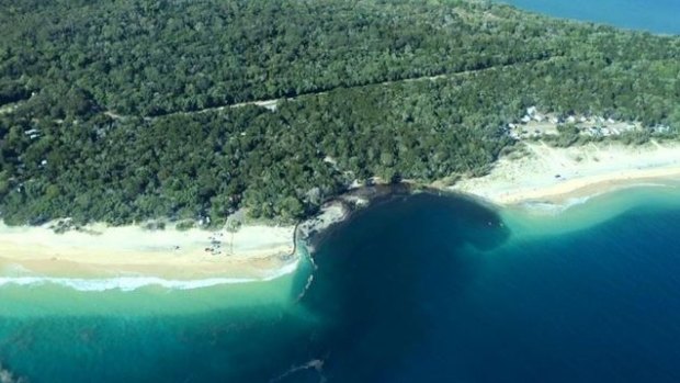 As captured by Higgins Storm Chasers, the erosion-hole that claimed a caravan and a car at Inskip Point, and triggered the evacuation of 140 campers.