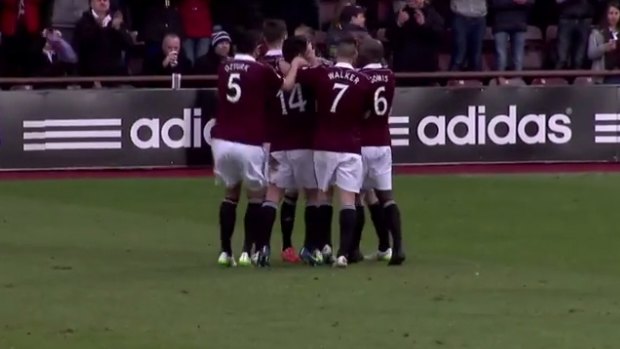 Hearts players celebrate one of their many goals.