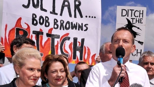 Then-opposition leader Tony Abbott attracted widespread criticism for speaking at a rally in front of misogynistic signs about Labor leader Julia Gillard in 2011.