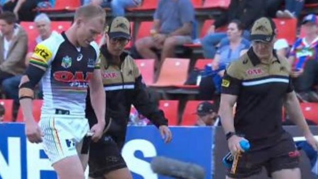 Fearing the worst: Peter Wallace leaves the field with a groin injury.