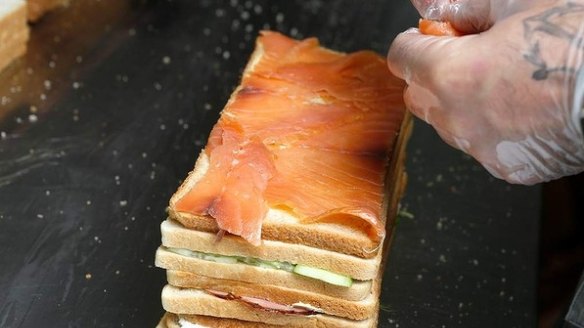 Tip: Be sure to overlap slices of salmon or ham, so that there aren't any gaps. 
