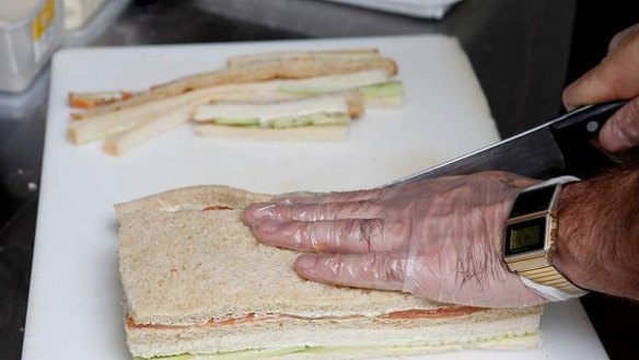 Tip: Be gentle and try not to press down on the bread when trimming the crusts. 