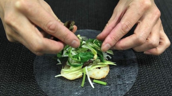 7. Then add sliced lettuce, mint and shiso mixture. 
