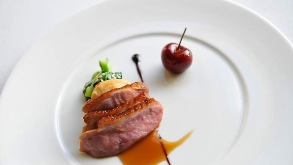 Degustation menu at Jacques Reymond. Course six ... Ligurian honey glazed pekin duck, pickled cherry and barbajuan. 
