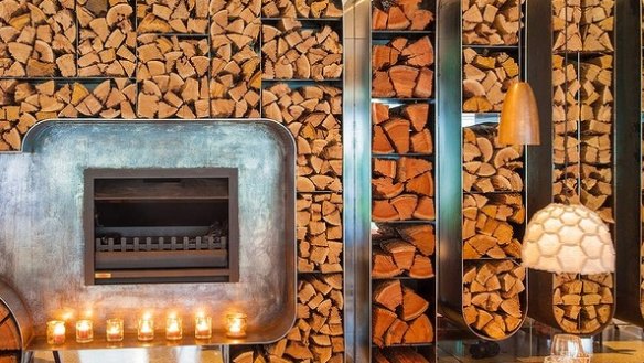 Woodfire Grill's walls are stockpiled with timber.