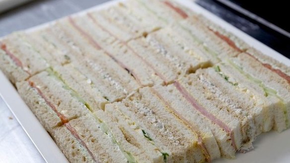 Step 14: Arrange the sandwiches in an alternating pattern, with fillings facing upwards. 
