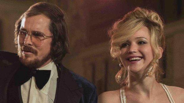 American Hustle: Jennifer Lawrence and Christian Bale.