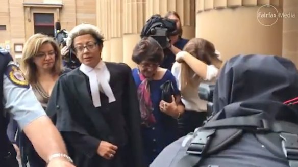 Judith Obeid, centre, leaves court after her husband Eddie was jailed. 