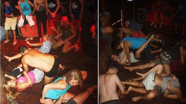 A photo issued by Cambodian National Police featured the group of foreigners accused of "dancing pornographically" at a party in Siem Reap, near Angkor Wat.