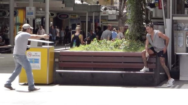 Lee Matthew Hillier, pictured being confronted by an armed police officer, locked down the Queen Street Mall in March 2013.