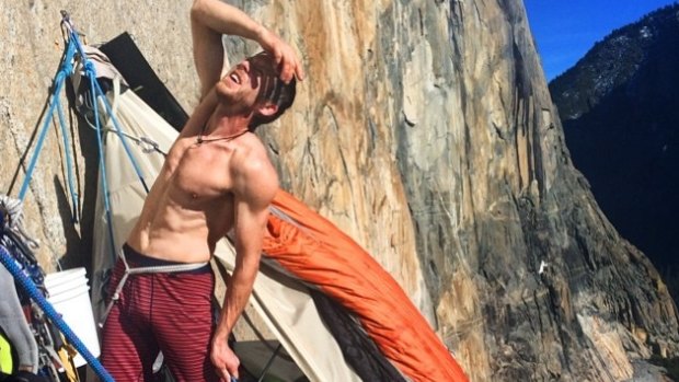 Tommy Caldwell rests on Monday to heal his fingertips on the side of Dawn Wall. 