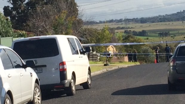 Police investigate outside George Williams' home.