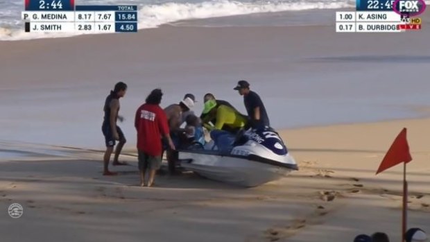 Bede Durbridge is lifted off the back of the rescue jet-ski.