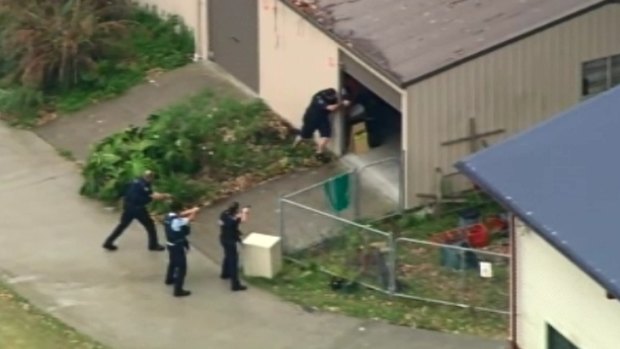 A police hunt was launched after reports of a gunman in Logan.
