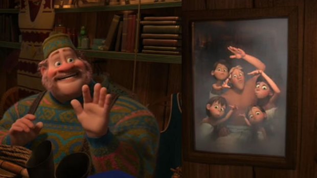 Frozen's Oaken showing his 'family' portrait.