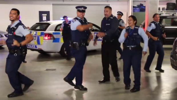 New Zealand Police officers doing the running man challenge.