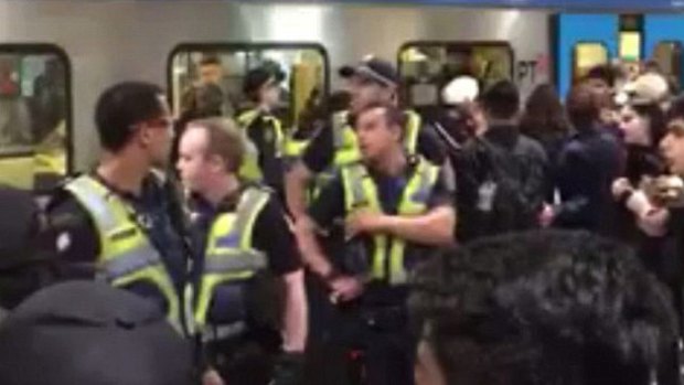 A Flinders Street Station brawl spills down to platforms four and five on Saturday around midnight.